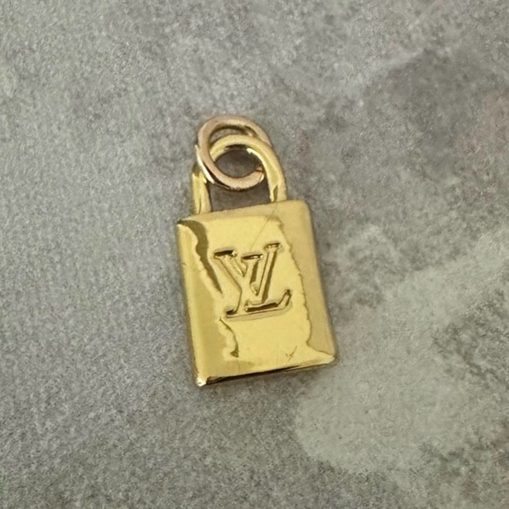 Louis Vuitton Gold Padlock Charm - stamped LV on back, Authentic, Genuine